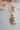 Golden charm pendant