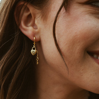 Gold heart earrings