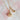 whisk charm necklace